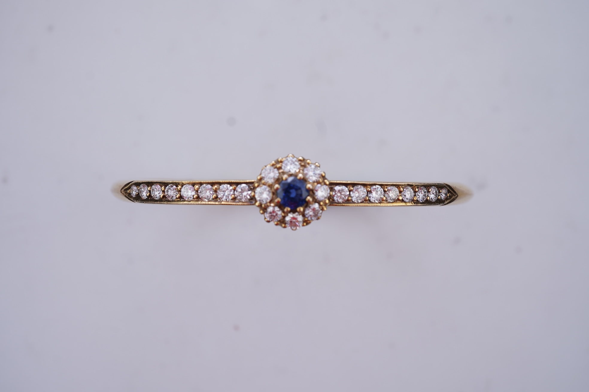 A sapphire and diamond bangle